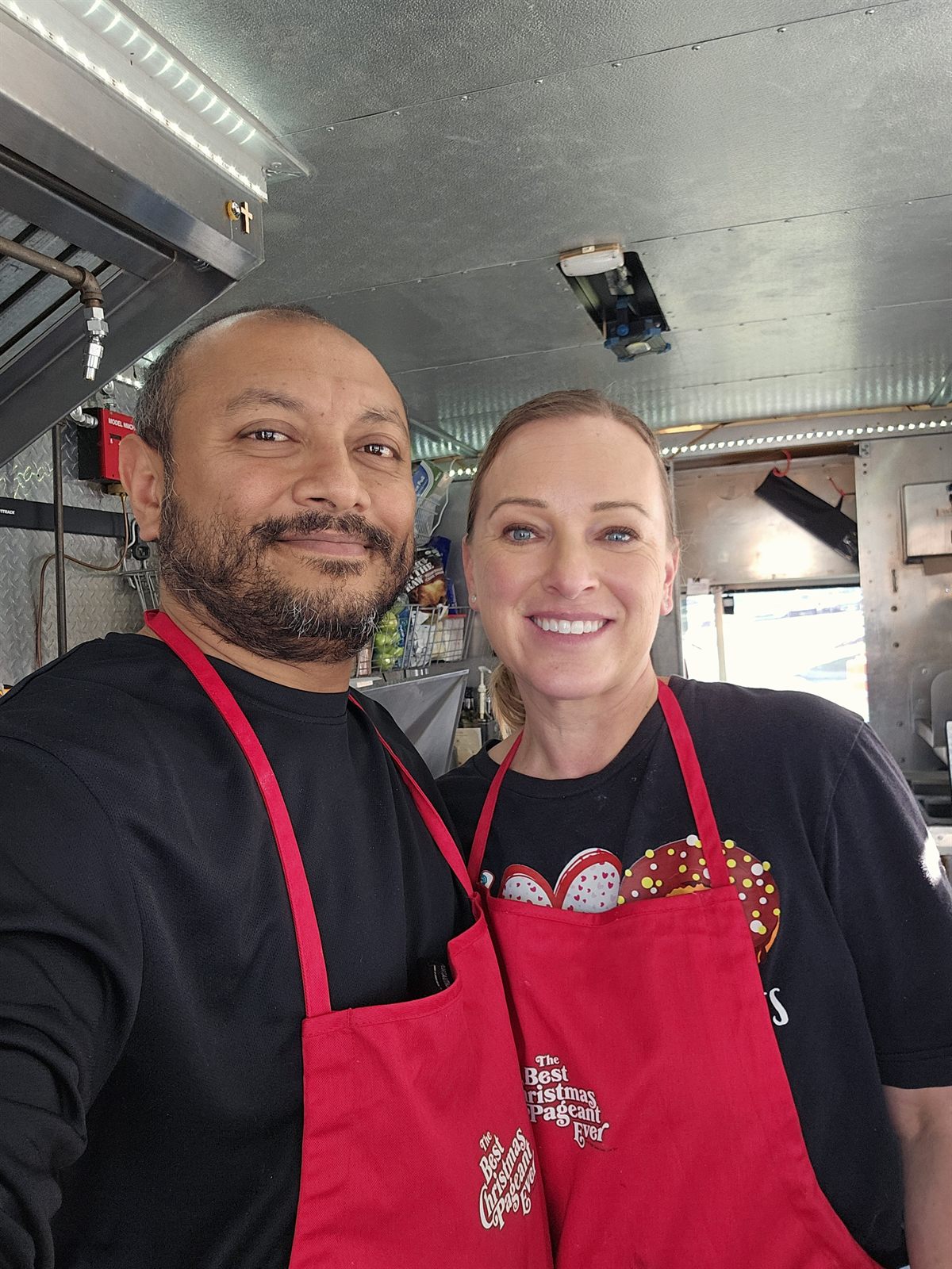 Lindsey and Mithoon, who founded Donut I Love U, inside the truck.